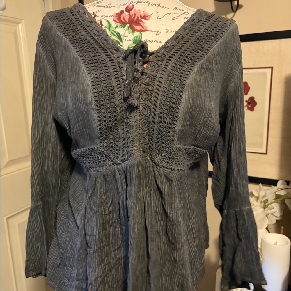 Torrid top , small hole in right sleeve
